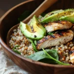 Top view of a bowl of kasha with fresh herbs, showing a low-carb version of the dish